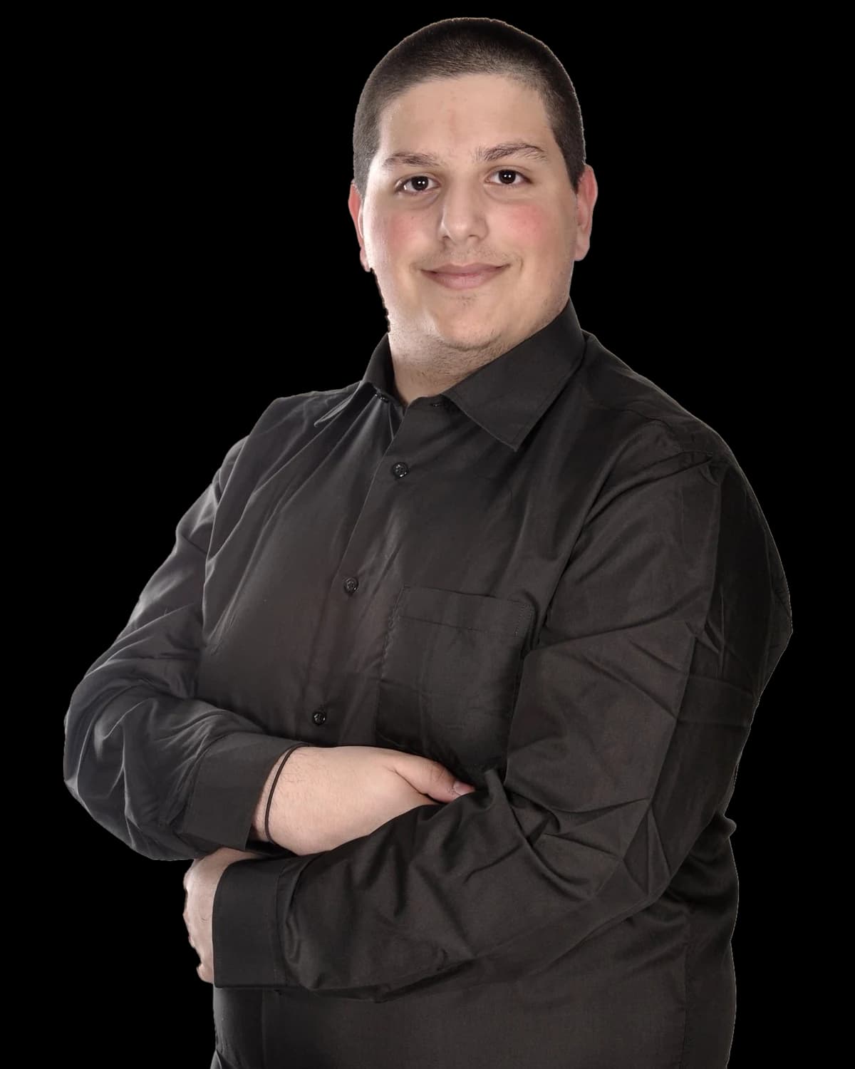Alessandro Cacciola in a dark shirt with arms crossed